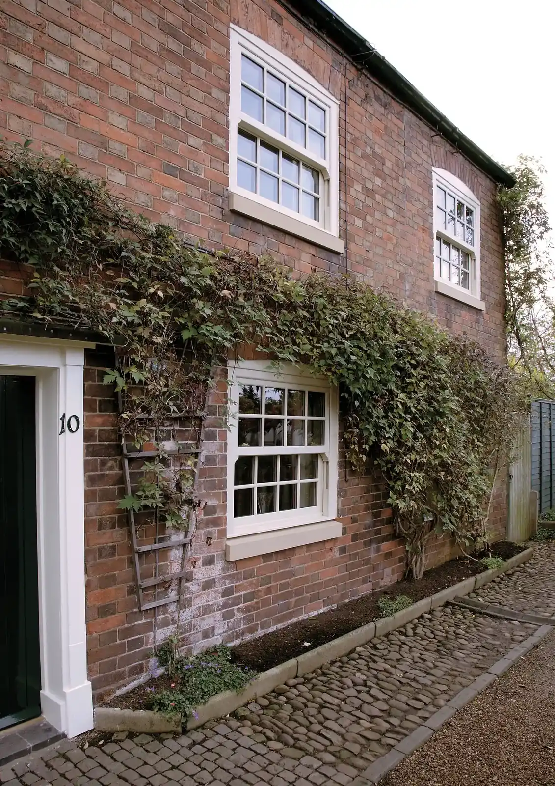 White uPVC casement window by PTF Glass